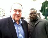 Hakim Mulraine with Arkansas Govenor Mike Huckabee